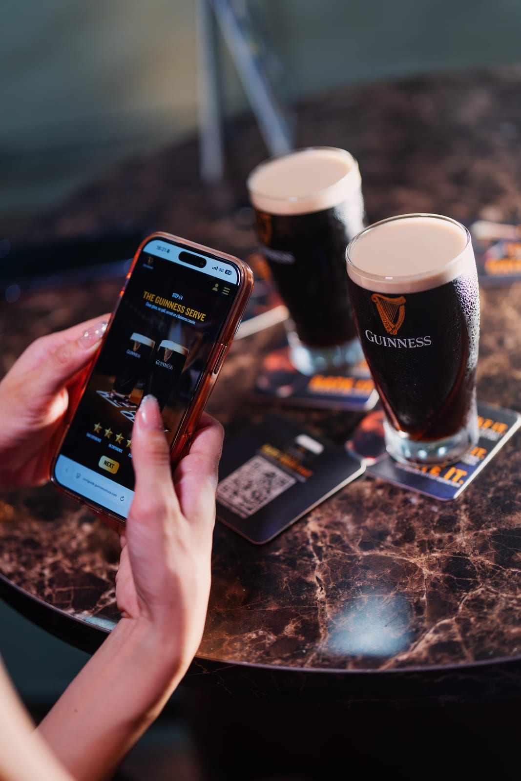 Guest rating a Guinness pint using the Rate Your Pint microsite