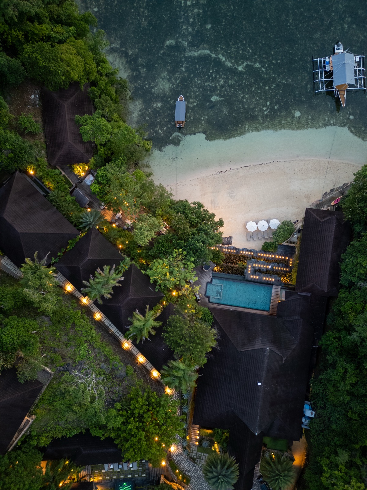An aerial view of Manami Resort’s secluded coastal setting