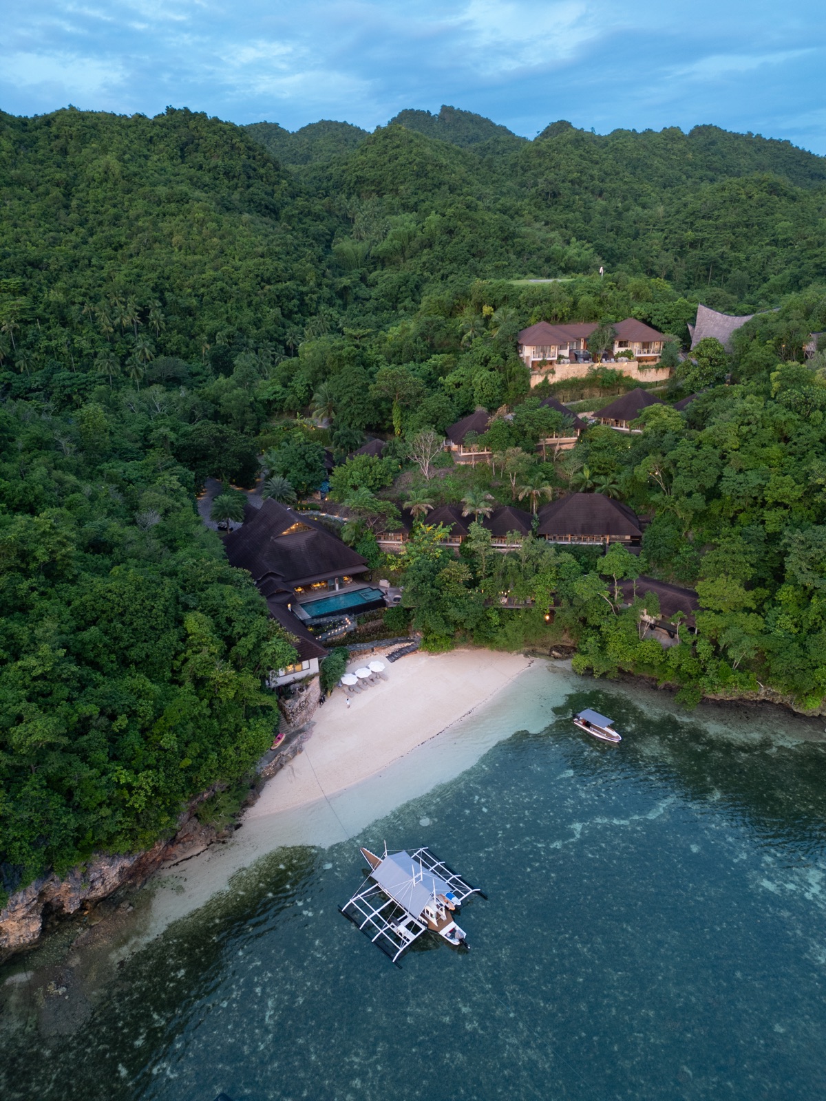 An aerial view of Manami Resort’s secluded coastal setting