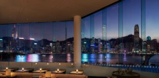 Regent Hong Kong Brings the Cinematic Soul of the City to Life Regent Hong Kong Lobby Lounge overlooking Victoria Harbour at dusk