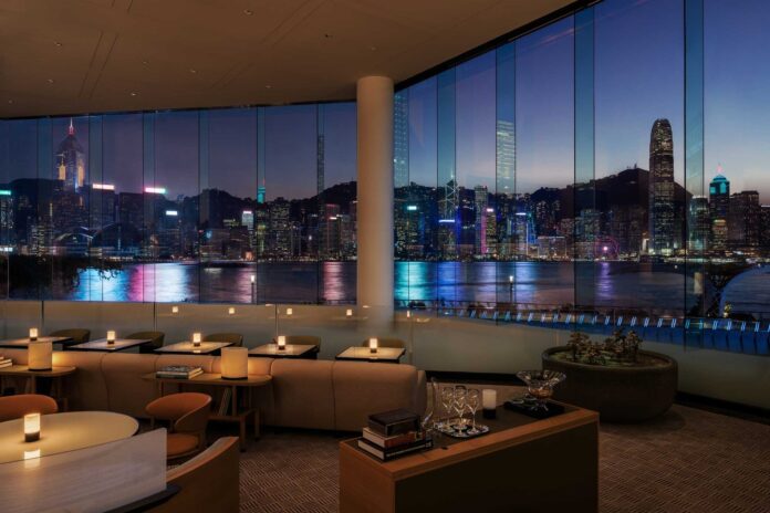 Regent Hong Kong Lobby Lounge overlooking Victoria Harbour at dusk