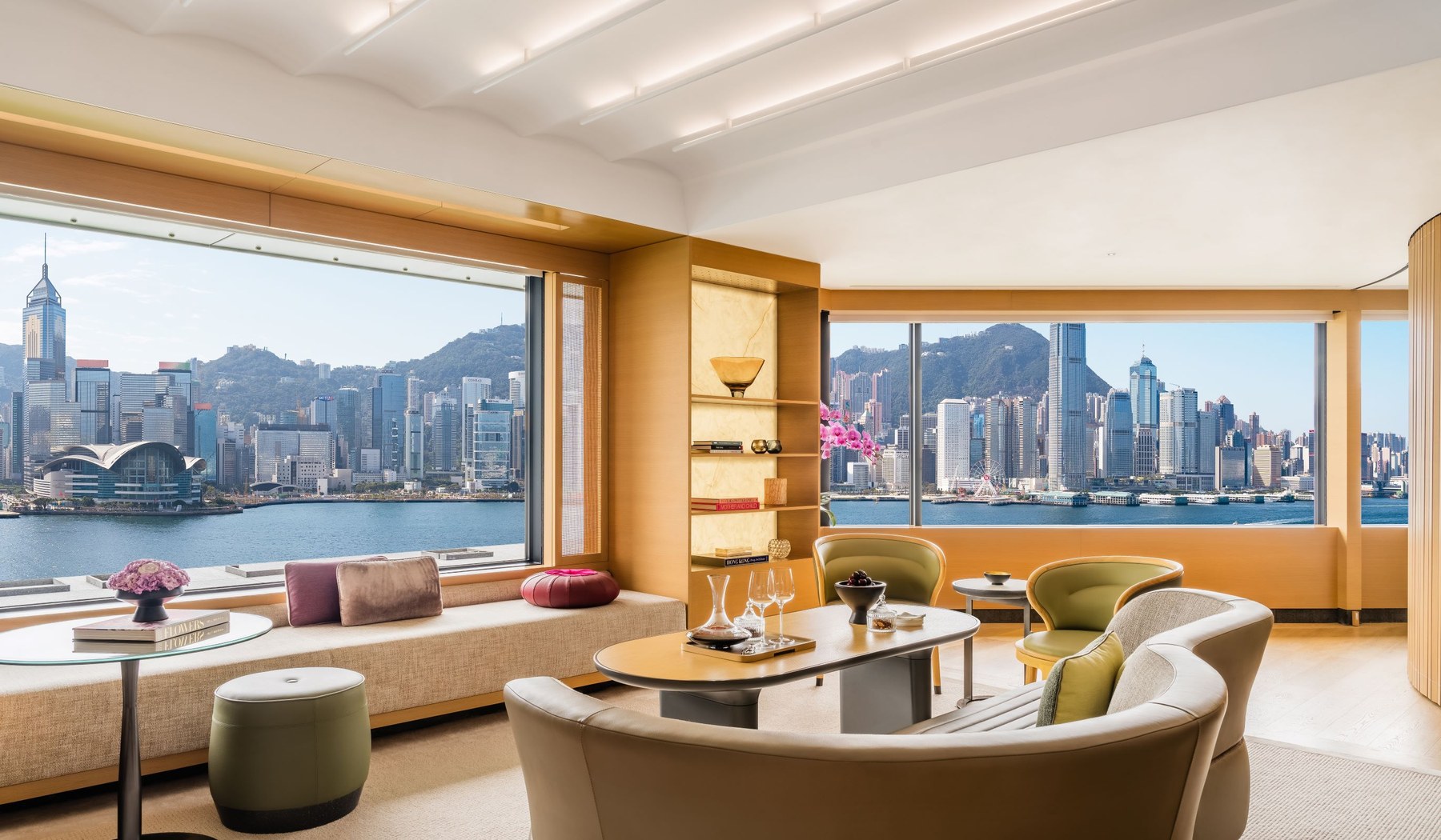 Regent Hong Kong corner suite living area with panoramic Victoria Harbour view