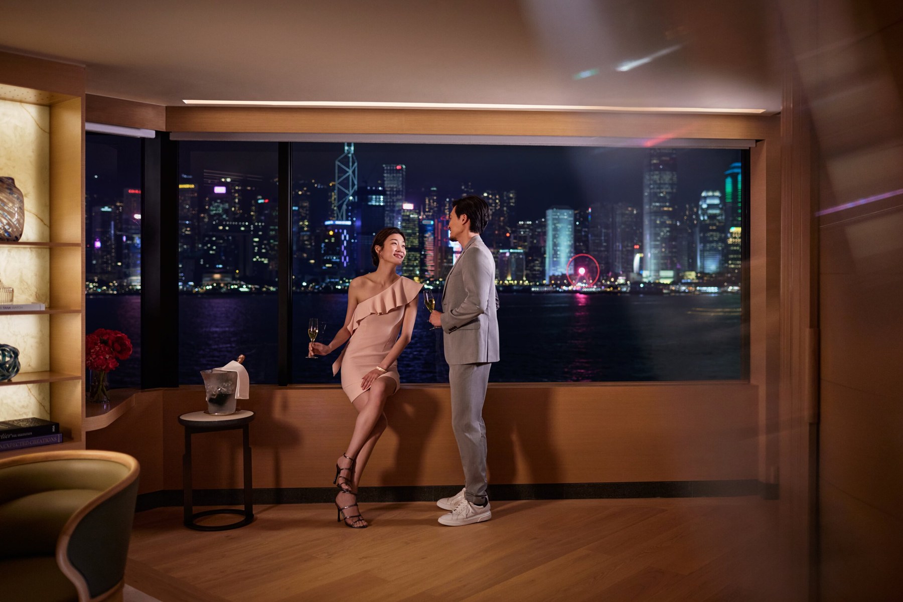 Regent Hong Kong lifestyle scene with Victoria Harbour skyline at night