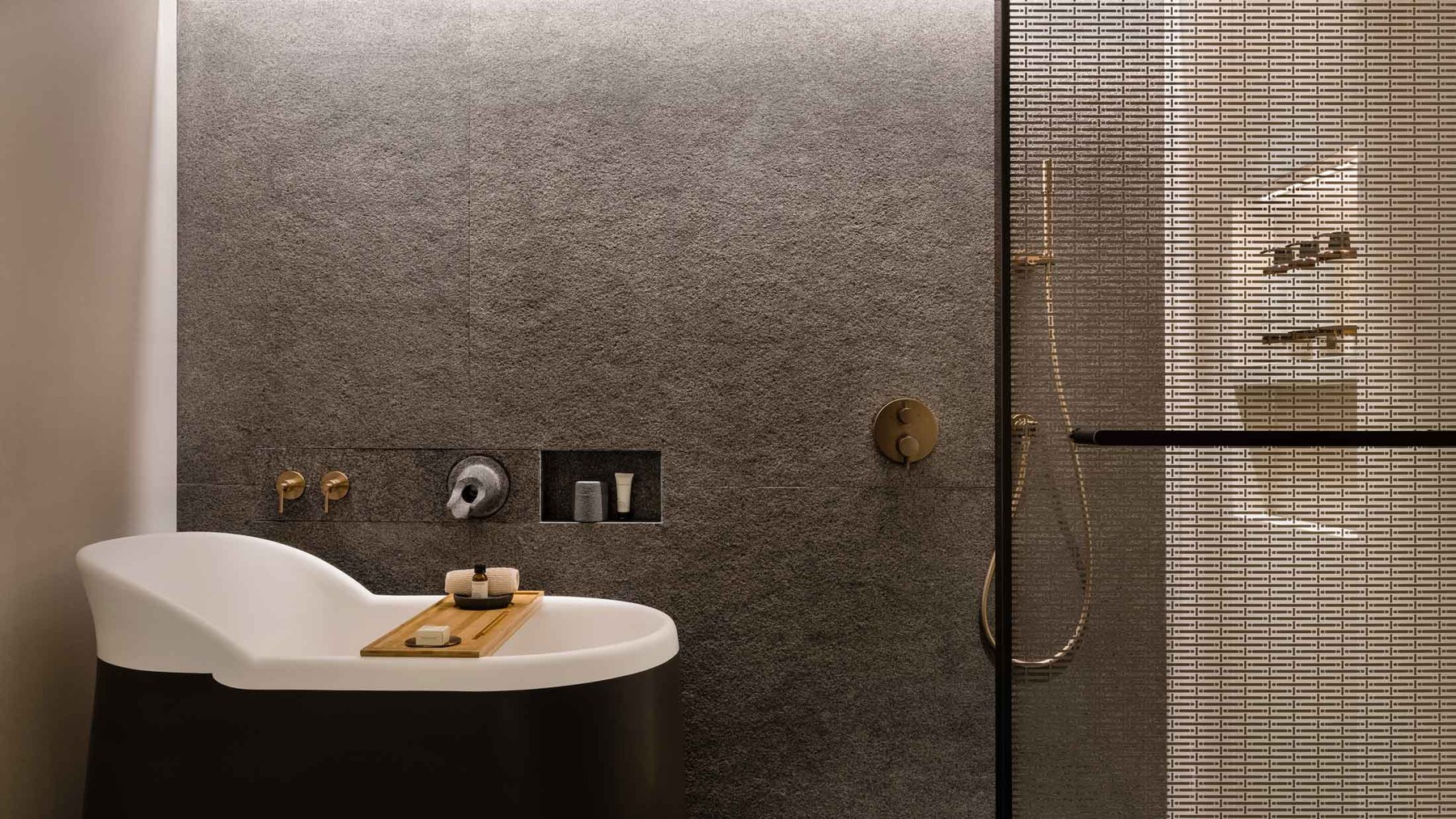 Regent Hong Kong oasis-style bathroom with freestanding bath and walk-in shower