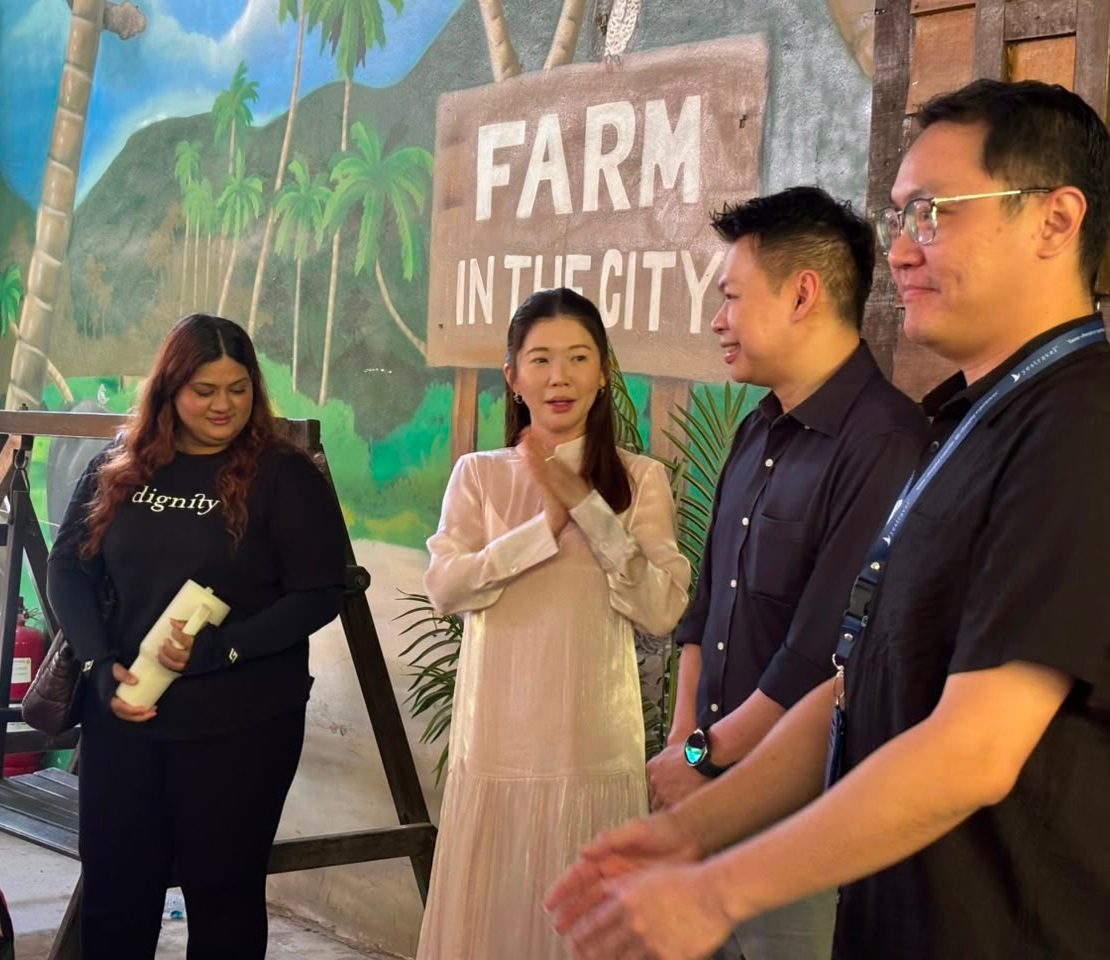Yes Travel and Dignity representatives with participating students at Farm In The City.