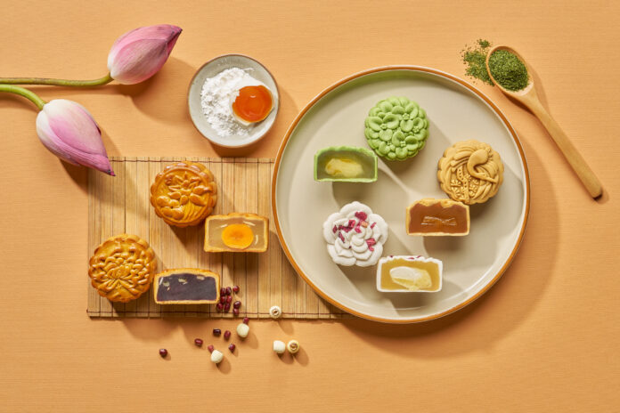 Le Méridien Putrajaya 2026 Mid-Autumn Mooncake Collection with assorted mooncakes and cut-open fillings