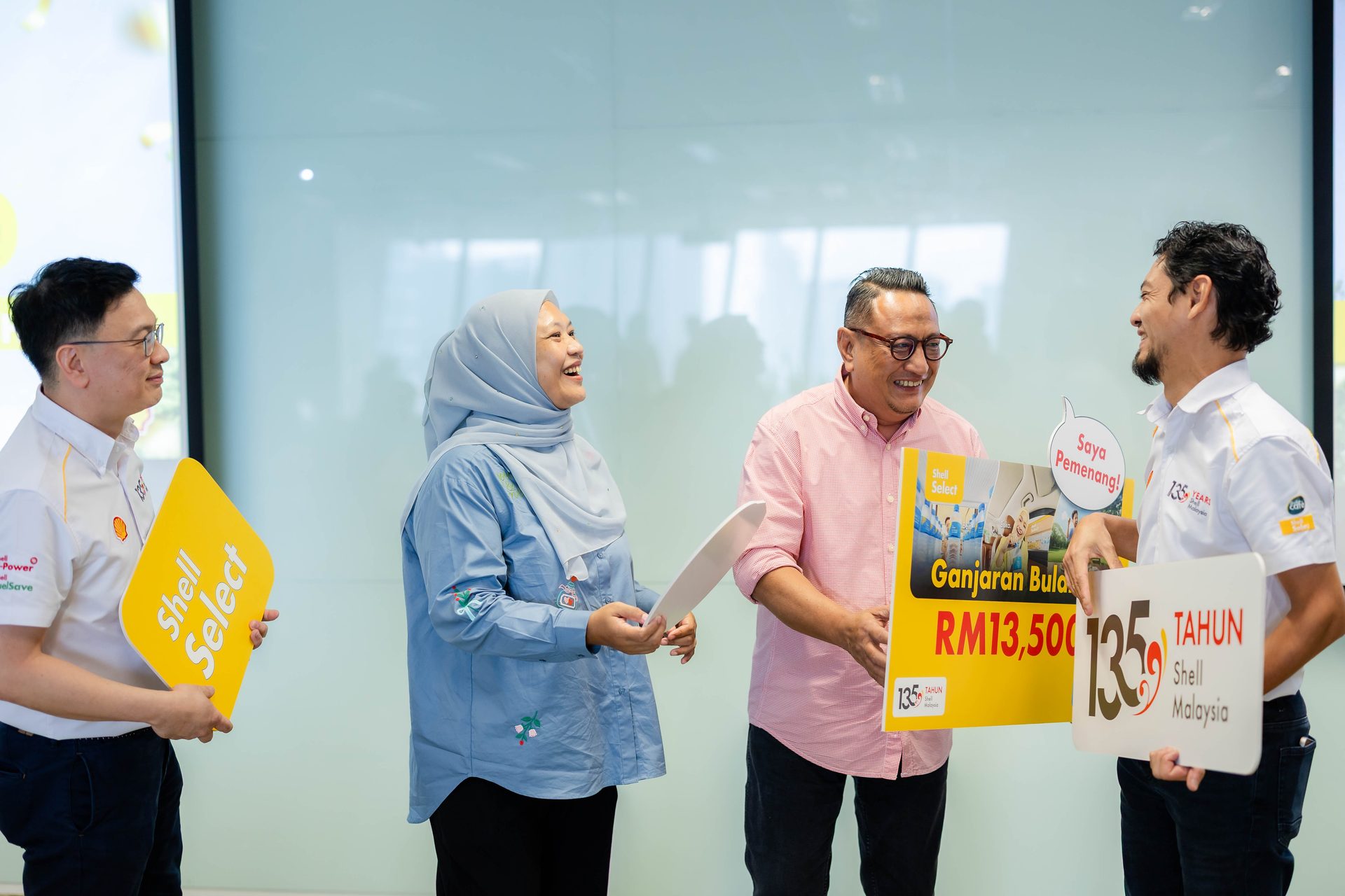 Shell water2go campaign winners holding their official prize boards